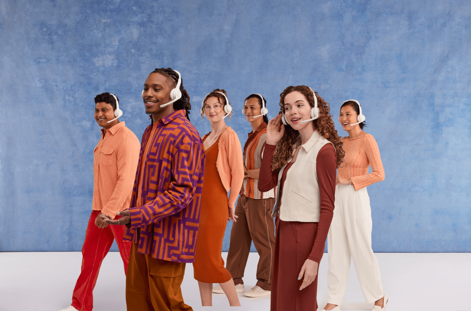 A support agent high-fives a customer after providing good customer service.