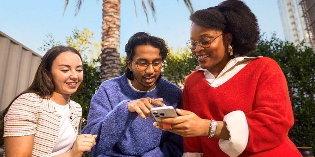 Customers interacting with personalized content on a smartphone